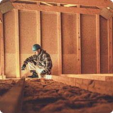 A worker sitting in the inside of a construction zone