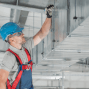 A worker looking at hvac